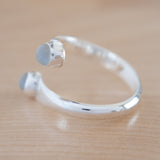 Side view of the Moonstone and Sterling Silver Adjustable Ring with Two Stones