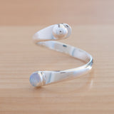 Side view of the Opal and Sterling Silver Adjustable Ring with One Stone and One Granule