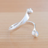 Side view of the Opal and Sterling Silver Adjustable Ring with One Stone and One Granule
