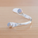 Side view of the Opal and Sterling Silver Adjustable Ring with Two Stones