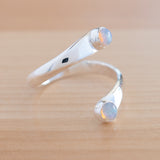 Side view of the Opal and Sterling Silver Adjustable Ring with Two Stones