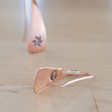 Front and Back Views of Triangle-Shaped Dangle Earrings in Copper Stamped with Pinwheels