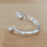Side view of the Sterling Silver Adjustable Ring with Two Granules