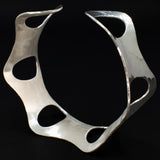 Side view of hammered silver cuff bracelet with ovals from Capulin Creations