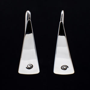 Front view of triangle-shaped sterling silver earrings stamped with small spirals from Capulin Creations