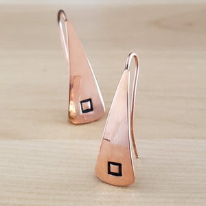 Front views of Triangle-Shaped Dangle Earrings in Copper stamped with squares