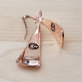 Back views of Triangle-Shaped Dangle Earrings in Copper stamped with stars