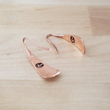 Back Views of Triangle-Shaped Dangle Earrings in Copper Stamped with Sunrays