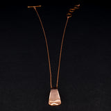 Full view of the Triangle Pendant Necklace in copper from Capulin Creations