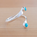 Side view of the Turquoise and Sterling Silver Adjustable Ring with Two Stones